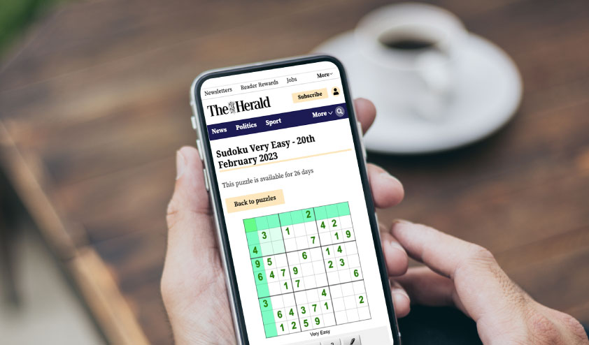 A phone displaying Sudoku on The Herald website